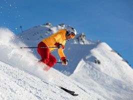 Skier yellow jacket
